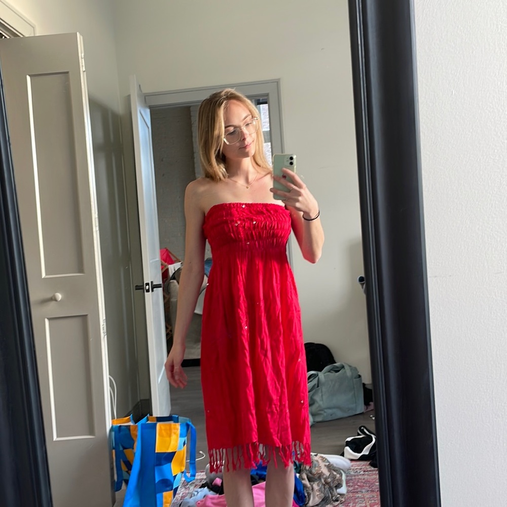 Red strapless dress. No brand. Probably a women’s small.